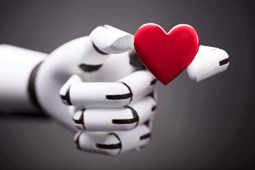 Robot holding heart in hand