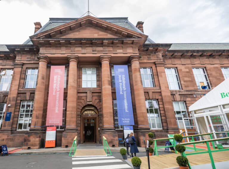 Edinburgh College of Art building with banners announcing the Edinburgh International Book Festival