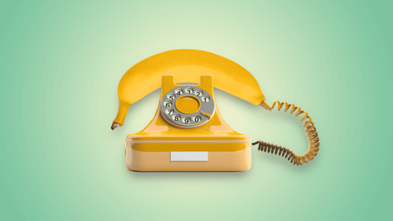 Banana on yellow phone with green gradient background