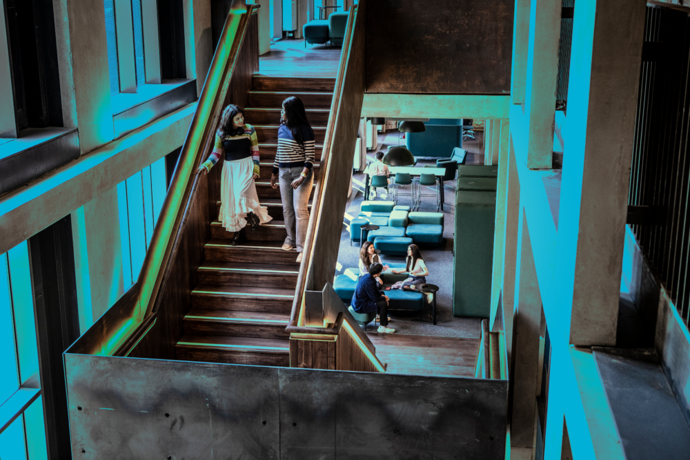 students walking through building
