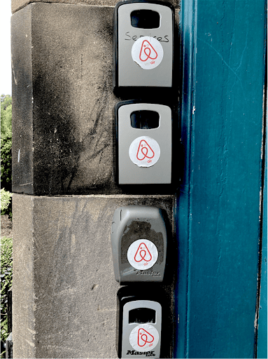 keysafes beside edinburgh door with airbnd logos on them all