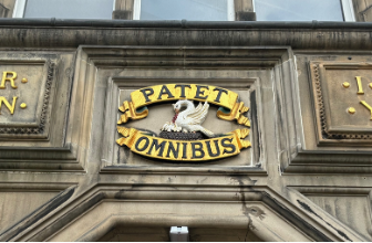 Inscription above main entrance to Edinburgh Futures Institute reads Patet Omnibus, which means open to all.