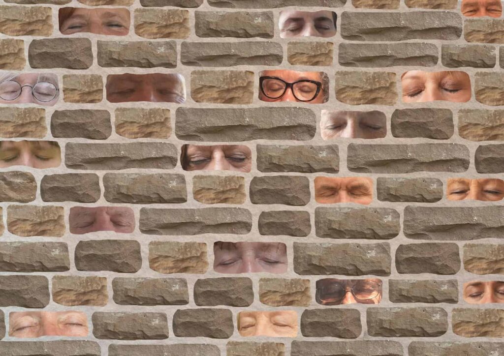 Brick wall with eyes superimposed