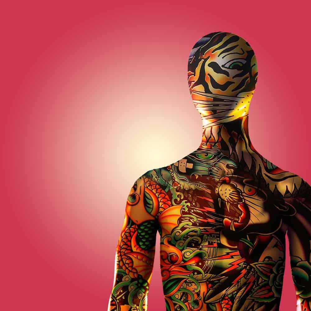 tattooed mannequin set against red gradient