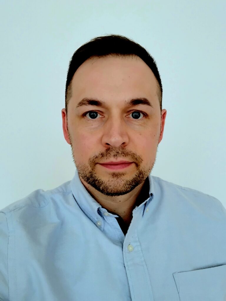 Headshot of Kamil Dalmata
